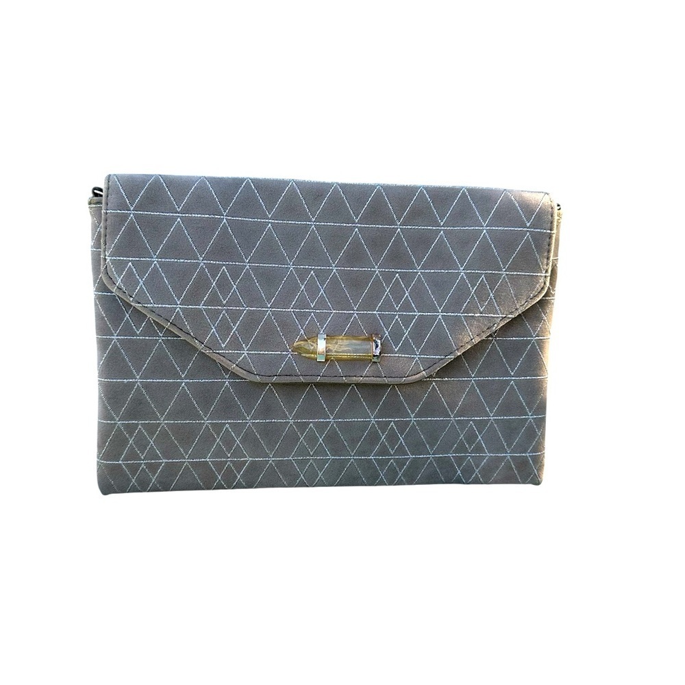 Stella & Dot suede clutch with crystal on the front multiple pockets inside